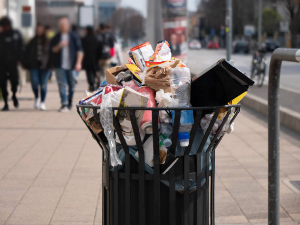 Unsorted waste bin in the city, Rubbish bin overflowing with rubbish trash