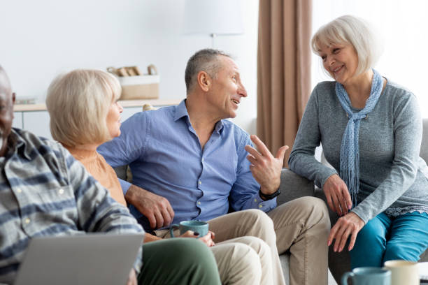 istock Cheerful pensioners drinking tea and chatting at sanatorium 1478506005