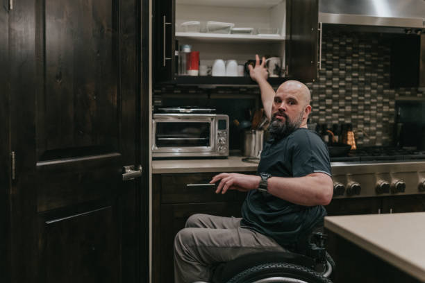 istock Man at home cooking a meal 1478508100