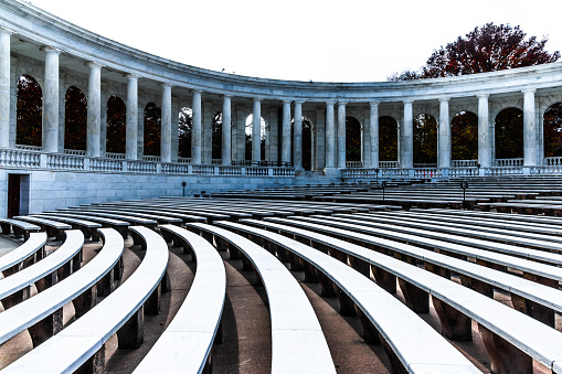 Memorial Amphitheater located in Arlington National Cemetery. The Cemetery is one of the famous tourist destinations in the USA. About 400,000 people are buried in its 639 acres land.