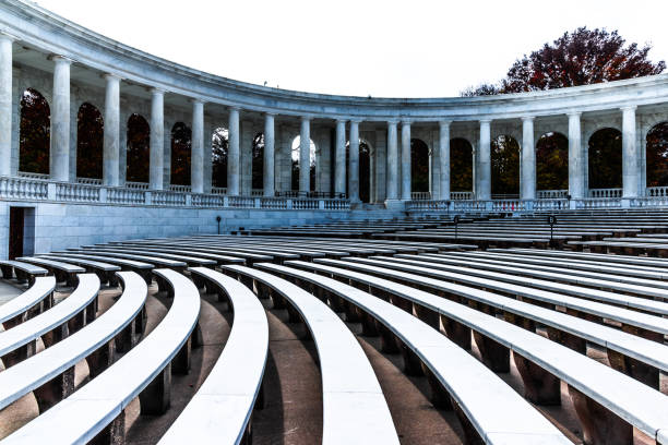 Memorial Amphitheater Memorial Amphitheater located in Arlington National Cemetery. The Cemetery is one of the famous tourist destinations in the USA. About 400,000 people are buried in its 639 acres land. memorial amphitheater stock pictures, royalty-free photos & images