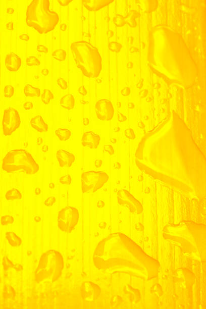 istock Yellow wooden pattern background with water drops. 1478508277