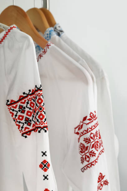 istock Beautiful shirts with different embroidery designs on white background. Ukrainian national clothes 1478510738