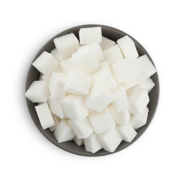 istock Bowl with cubes of refined sugar isolated on white, top view 1478511125