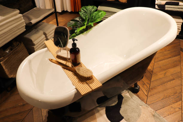 istock bathroom interior, white bathtub and accessories 1478512262