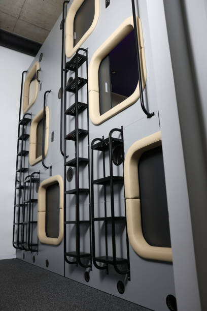 istock Capsules in modern pod hostel, low angle view. Stylish interior 1478512977