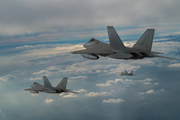 istock Jet aircrafts flying over the clouds. 1478518575