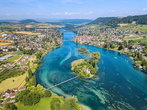 Aerial image of Lower Rhine river with view of Islet Werd and city Stein am Rhein. It is a border between Switzerland and Germany.