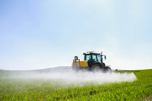 Spraying farm on a tractor close-up. High quality photo