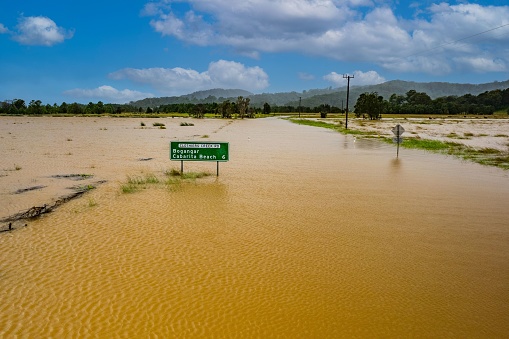 A green sign in the water. New South Wales flooding, Australia.