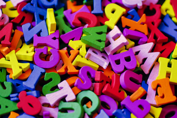 istock Colorful wooden alphabet and background material 1478545633