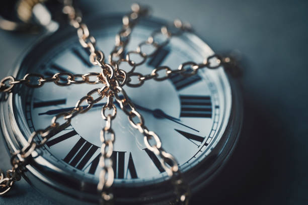 istock gold chain and pocket watch 1478546163