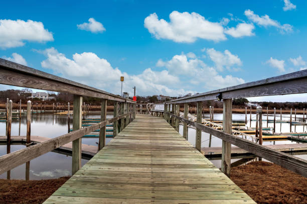 istock Blue sky over the Sesuit Harbor Marina on Cape Cod in East Dennis. 1478547465