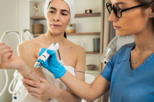 istock Middle-aged woman getting a beauty treatment 1478547722