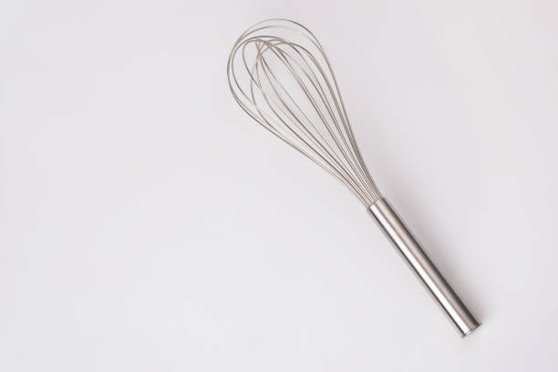 istock Stainless steel egg whisk on white background 1478555777