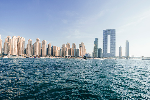 Dubai Marina cityscape, UAE. Panoramic view from the sea side