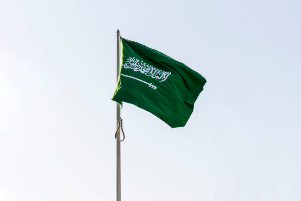 istock flag of Saudi Arabia against blue sky 1478557798