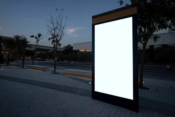 istock electronic scoreboard with an empty white screen on a city street. Copy space. Advertising on the road at night. 1478557843