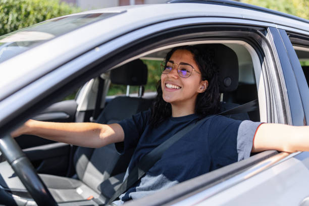 istock Young Latin Female Being Pulled Over While Driving By Police 1478561257