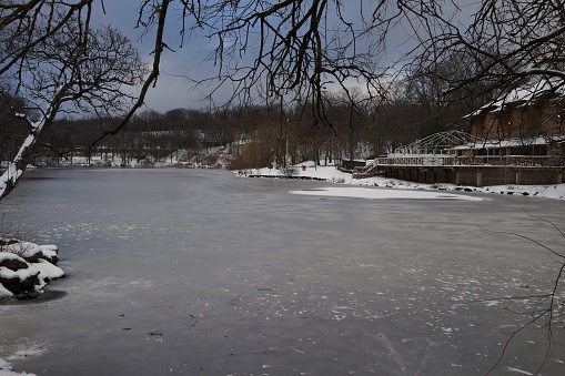 Still capture of recreational figure skater ice skates on outdoor rink