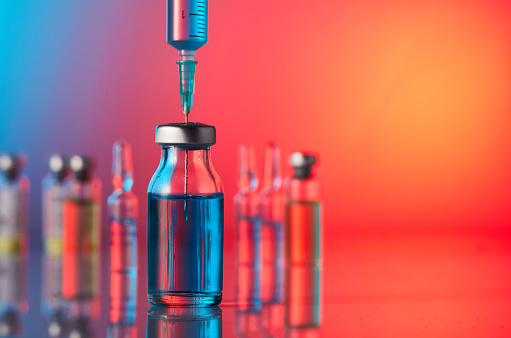 Close up shot of vaccines in a laboratory - Illustration for flu shot and Covid-19 vaccines