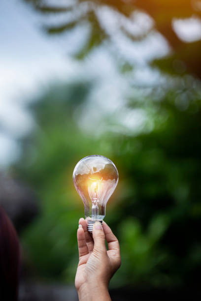 istock light bulb against nature, icons 1478599642