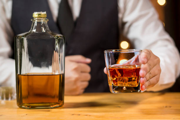 istock Bartender pouring Whiskey, on  bar, 1478599750
