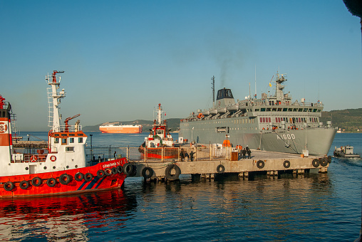 Çanakkale, Turkey - April 24, 2007 : Coast guard boat and military ship anchored in Çanakkale. A1600 military cruise ship