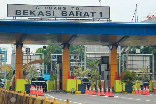 Bekasi, Indonesia in March 2023. West Bekasi Toll Gate, one of the entry and exit gates of the Jakarta Cikampek Toll Road.