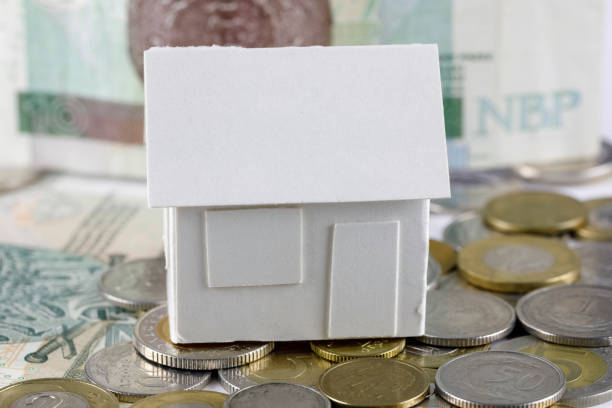 istock White detached house model and Polish zlotys 1478634399