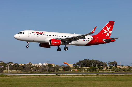 Luqa - Malta - March 26, 2023: Air Malta Airbus A320-251N (Reg: 9H-NEE) in updated colour scheme, latest addition to the AMC fleet landing after its very first flight as KM101 from London Heathrow.