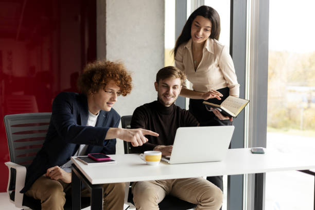 istock Young people, managers, workers at workplace, in modern office are working 1478639426