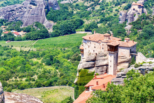 istock Aerial daylight view on monastery at coast of mountains 1478640190