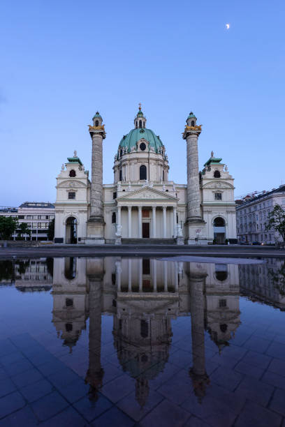 istock Karlskirche in Vienna Austria at sunset with reflection 1478641875