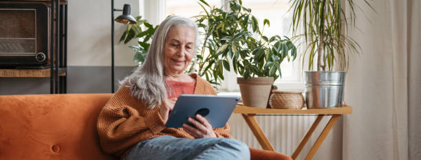 istock Senior woman spending her leisure time with a digital tablet. 1478644074