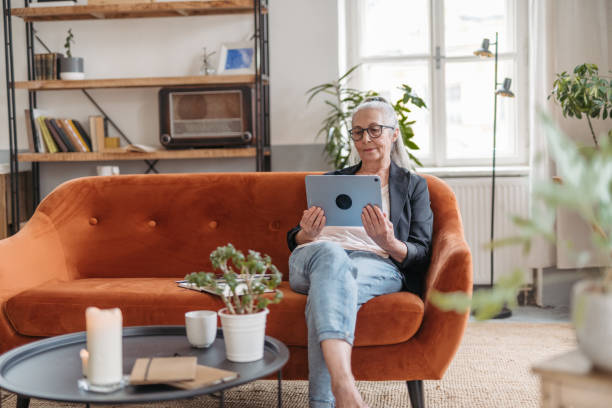 istock Senior woman spending her leisure time with a digital tablet. 1478644266