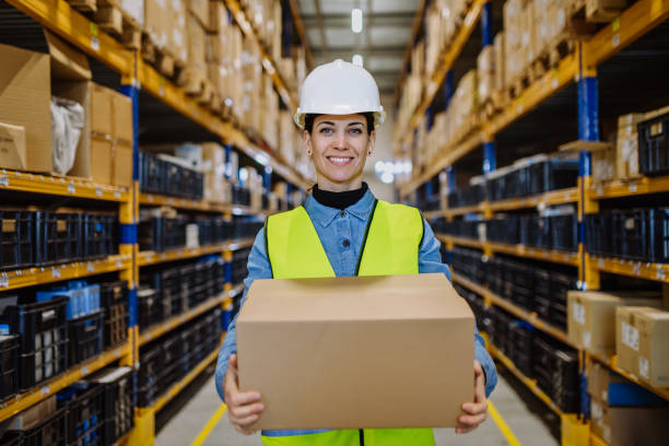 istock Warehouse female worker checking up stuff in a warehouse. 1478645740