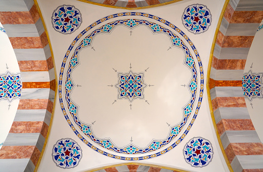 tile patterns on the ceiling of the mosque courtyard