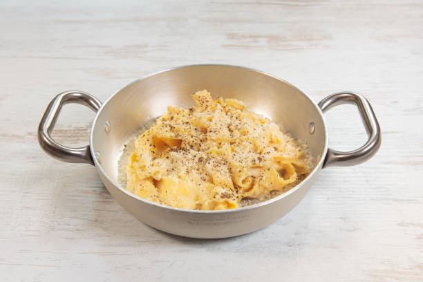 Gricia Fettuccine Pan Served Plate Gricia Fettuccine Pan Served Plate Tipical Italian Recipe pecorino romano stock pictures, royalty-free photos & images