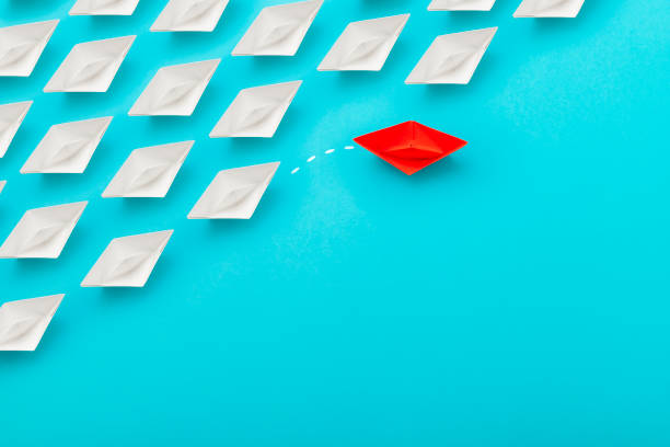 istock Standing out of the crowd concept: Pointing on different way 1478666827