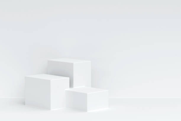 istock Three white square pedestal podium and white wall backdrop. White minimal wall scene for product display presentation, 3d rendering 1478671537