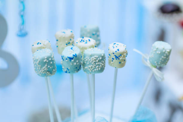 istock Close-up blue marshmallows with confetti sprinkles on a stick 1478675815