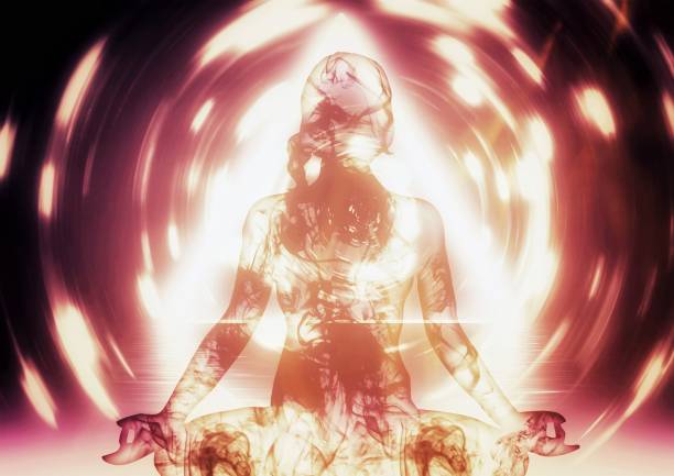 istock Silhouette illustration of a woman meditating with light effects 1478679772