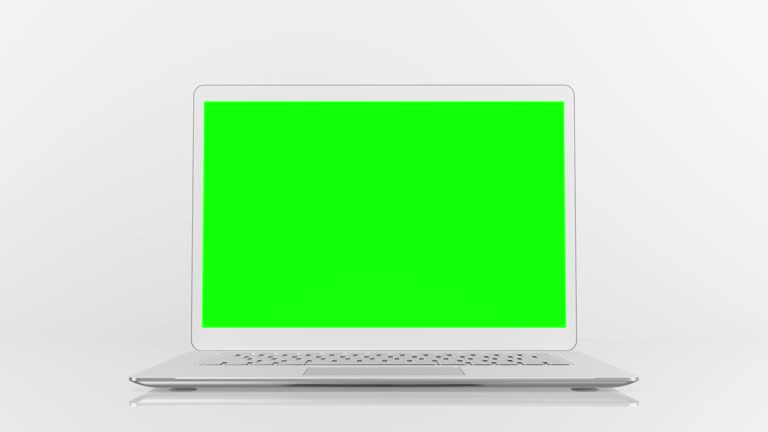 Laptop Mock-Up and green screen on work desk in white room. Designed in minimal. Can be used for background in education or business.