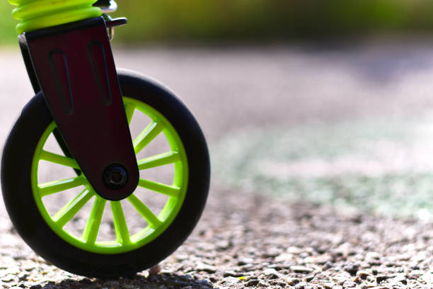 istock Rolling on Asphalt: A Close-Up View of the Scooter Wheel. 1478683330