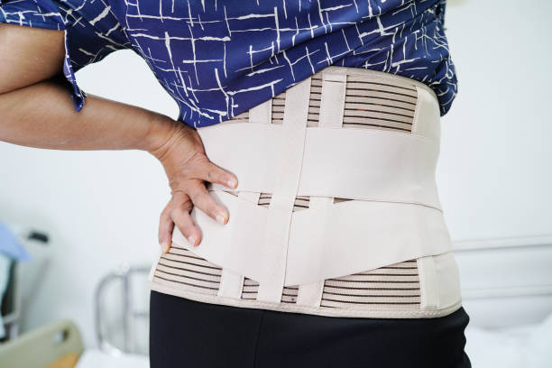 istock Asian senior wearing elastic support belt can help reduce back pain. 1478688114
