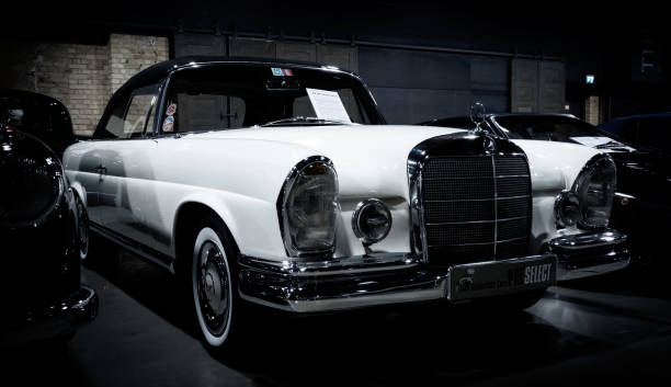 Berlin, Germany – January 15, 2021: GERMANY Nov 25, 2020. 1962 white Mercedes Benz 220 Seb Cabriolet W111 , Classic car in a public exhibition in Berlin.