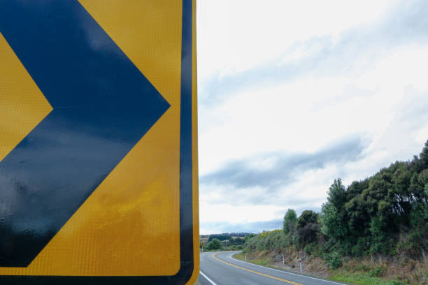 istock Road sign pointing at a road 1478690958
