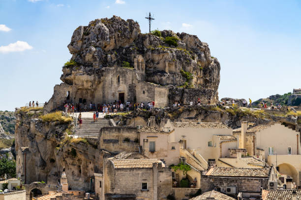 The ancient church of Santa Maria De Idris, Matera, Basilicata, Italy The ancient church of Santa Maria De Idris, an ancient cave church carved into the rock, Matera, Basilicata, Italy, August 2020 matera stock pictures, royalty-free photos & images