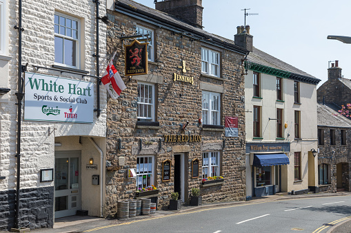 Sedbergh, Yorkshire, UK - 20 April 2019: Facade of a building in the village of Sedbergh . Sunny spring day. Yorkshire Dales, UK